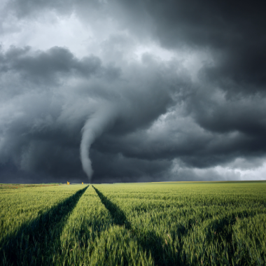 Tornado and its path through a field
