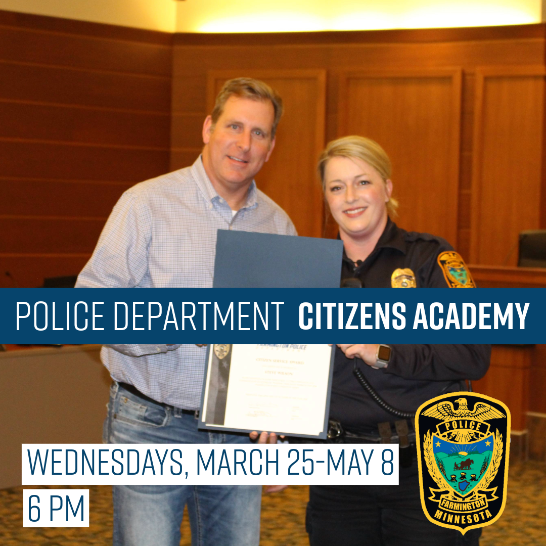 Citizens Academy Councilmember Wilson receiving his certificate with Sergeant Redmond-Palo